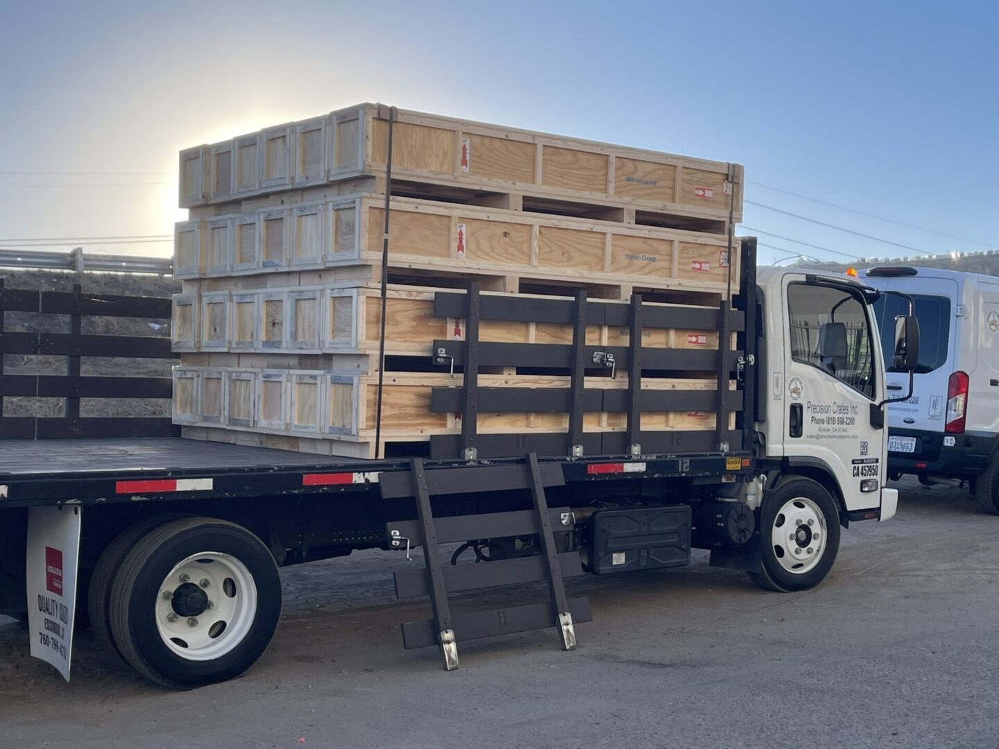 Precision Crates Inc. truck loaded with crates.